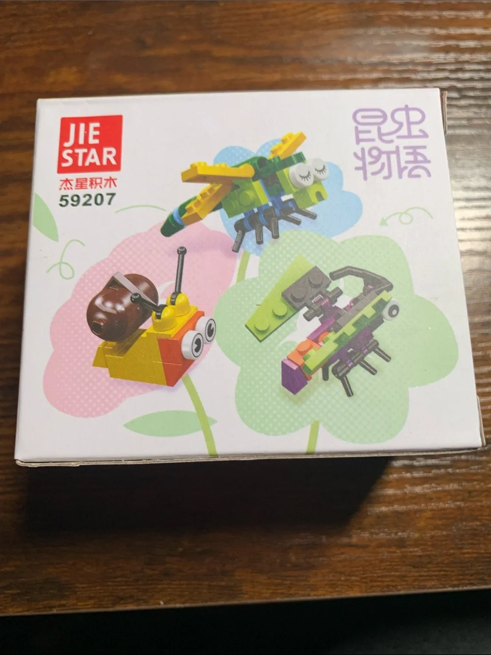 Kids Building Toy Beetle Model